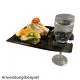 Schwarzer Mehrweg Partyteller aus lebensmittelechtem PP Kunststoff, stapelbar, leicht und sp�lmaschinengeeignet. Anwendungsbeispiel mit Stielglas und Canap�s - elegant f�r Events und Partys.